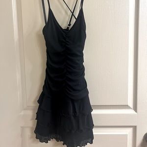 black ruffled mini dress